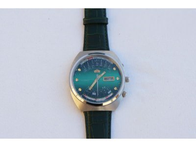 slikaRucni-sat-Citizen-Calendar-Automatic-za-10-dinara-33498737v800h600.jpg